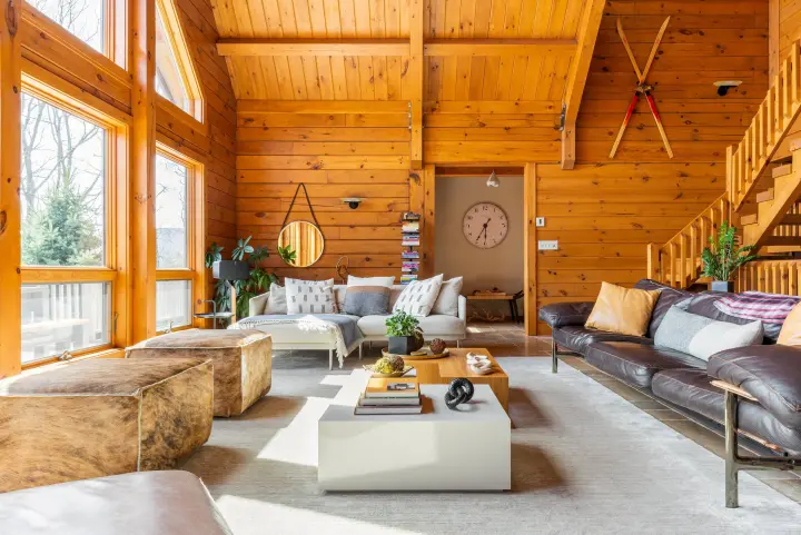 The living room has enough place for a group to spread out and chat or play board games. There are also plenty of books available for reading and browsing.