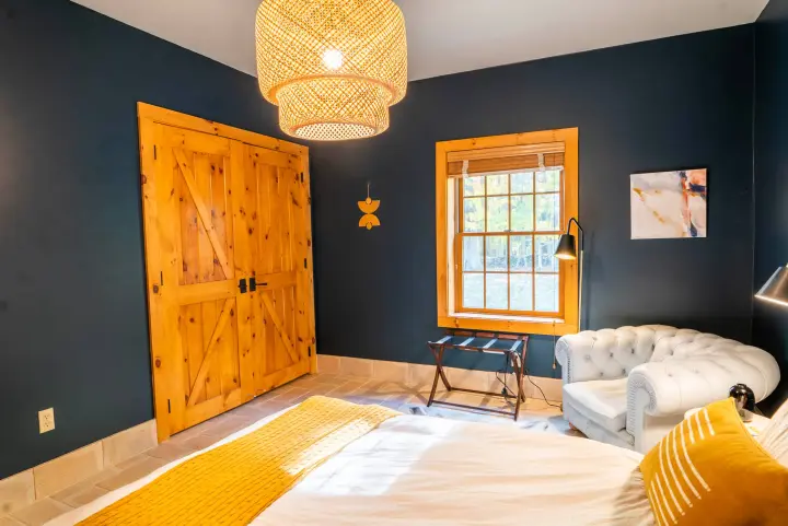 Cozy corner. This bedroom also gives you a large closet and full-length mirror.