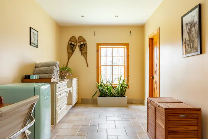 The spa hamper can hold your used towels and there is a mini-fridge for extra cooling capacity. The end of this hallway leads to the washer-dryer room.